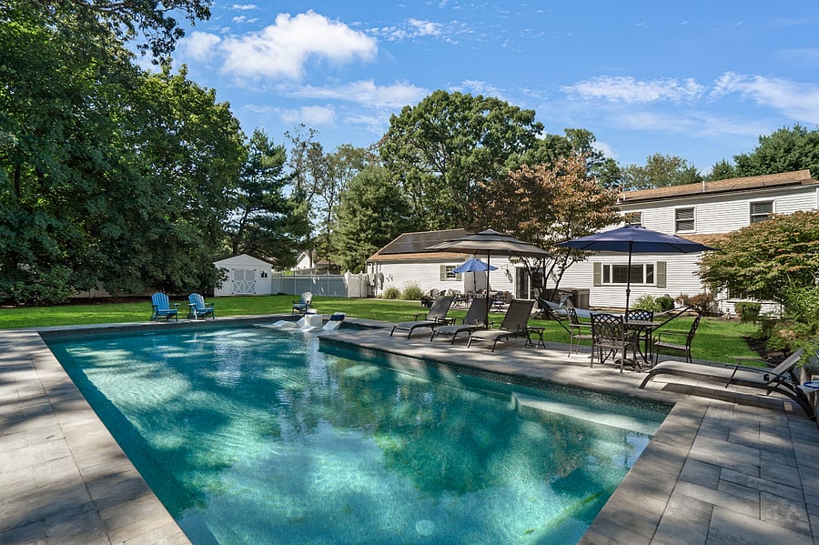 Pool area with comfortable lounges for soaking up the sun