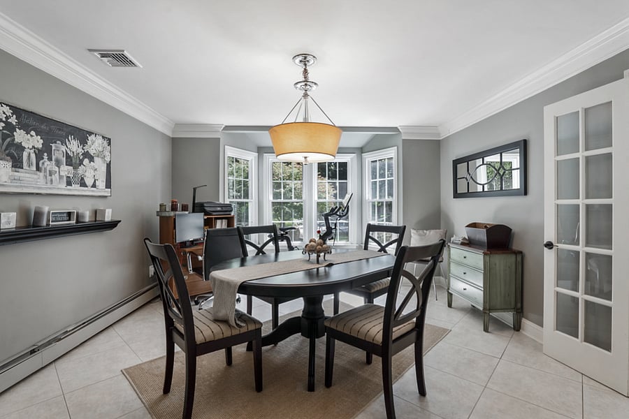 Dining area adorned with natural light