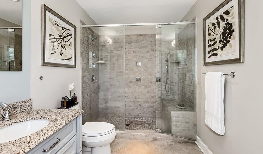 Full bathroom with sit down shower