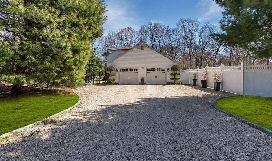 Large driveway going to the garage