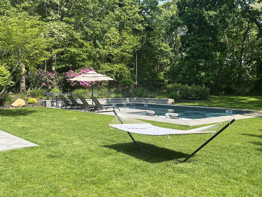 A peaceful yard adorned with a hammock!