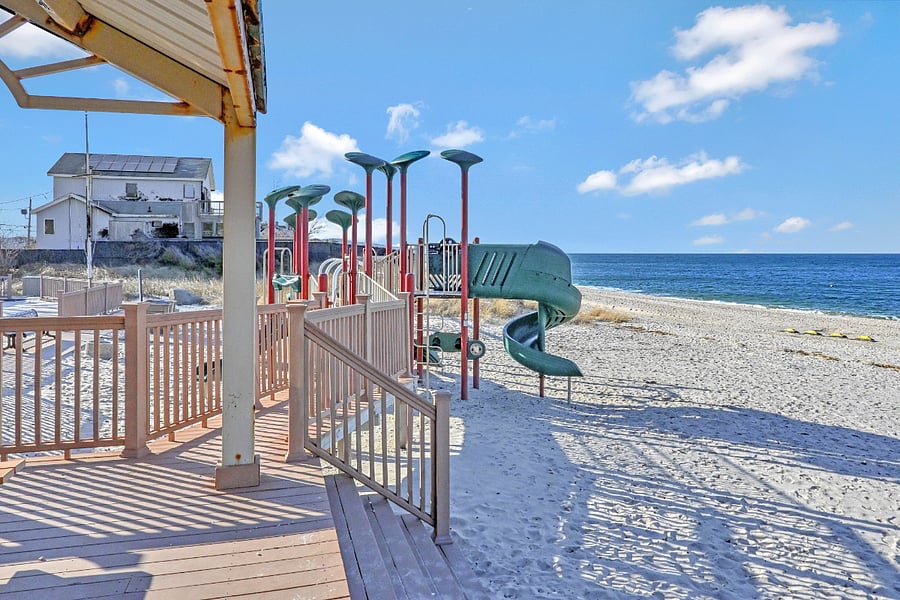 Let your child express their fun-loving nature at the playground on the nearby beach.