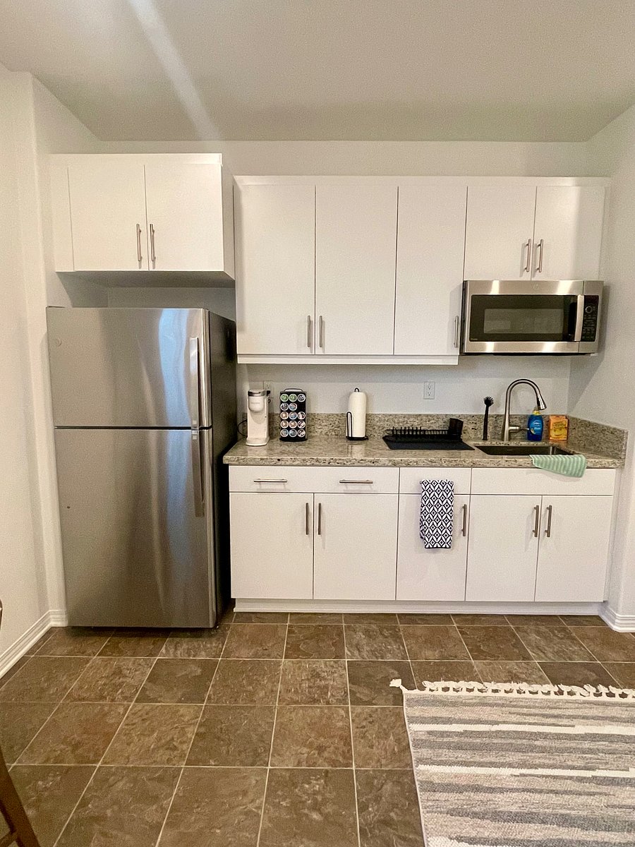 Kitchenette includes full size refrigerator, coffee maker, and microwave