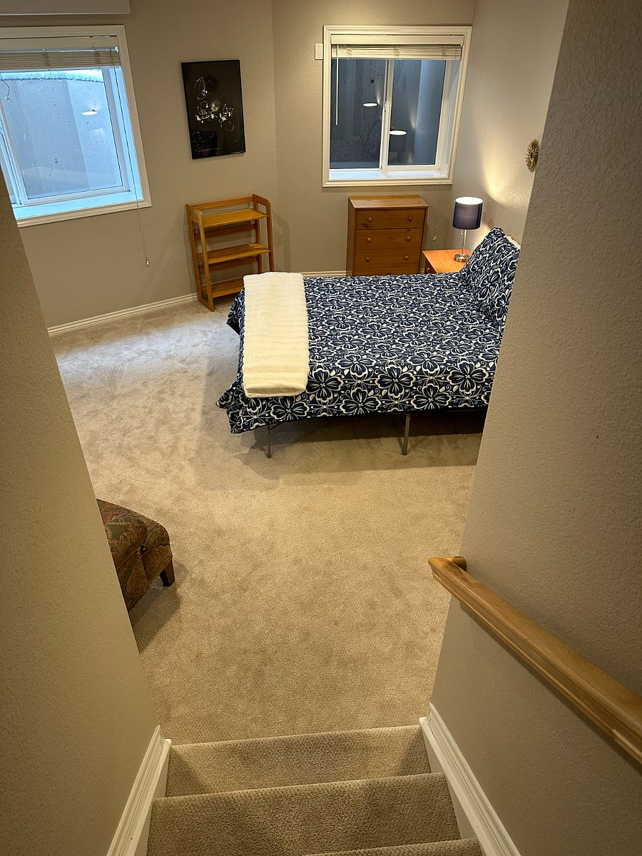 The steps down to the guest bedroom