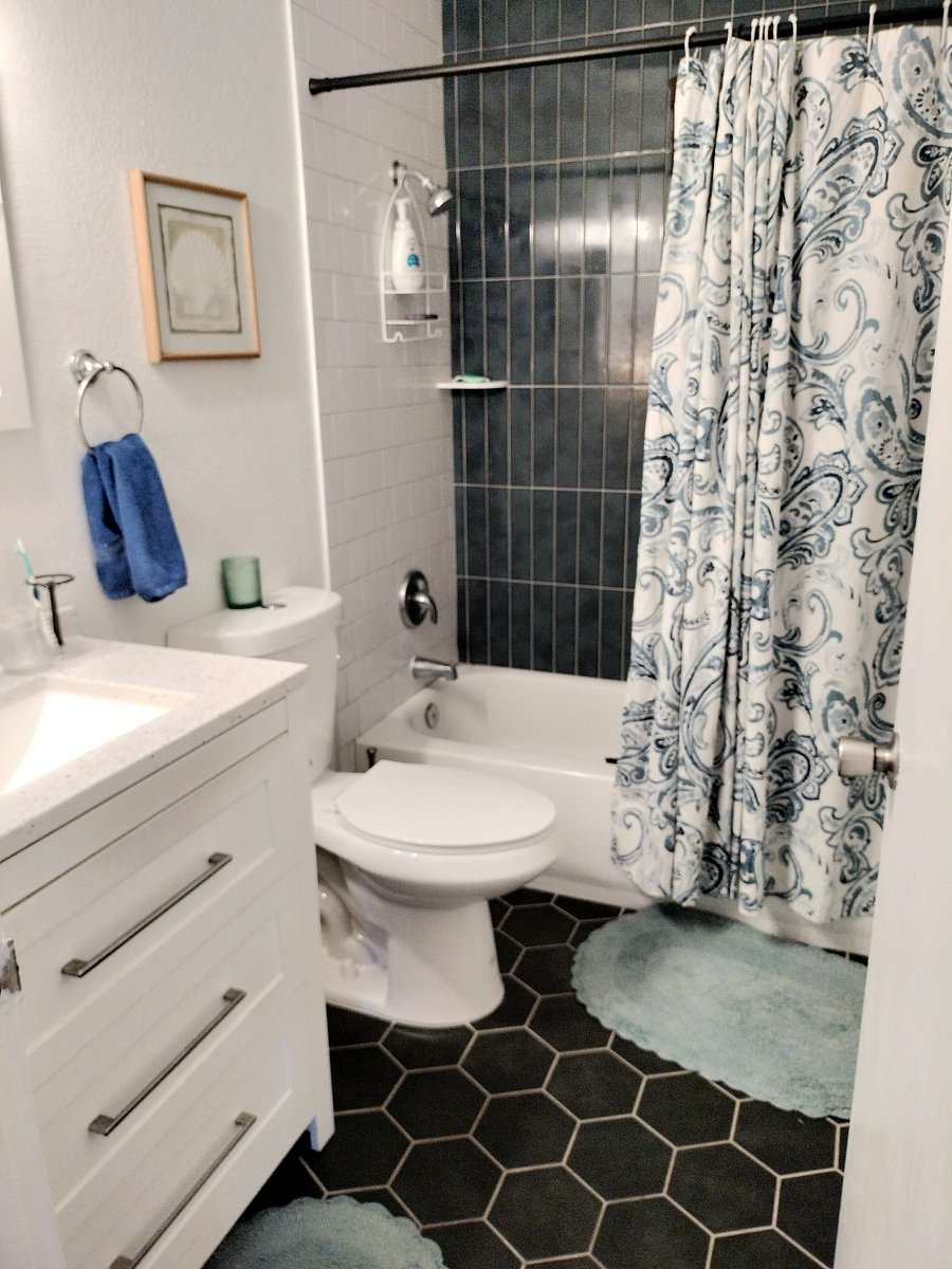 Full bathroom with tub/shower.