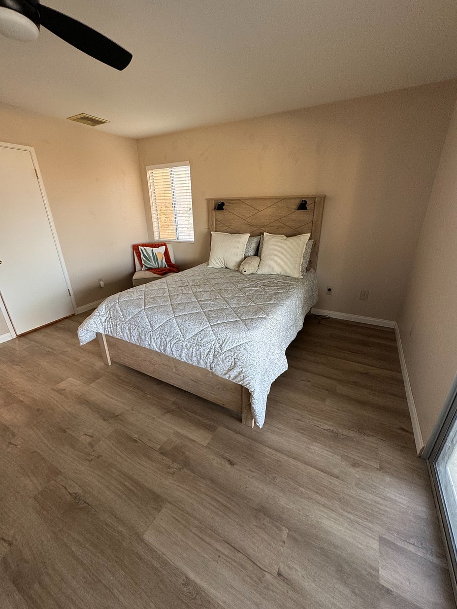 Primary bedroom with new bed and new pillowtop mattress