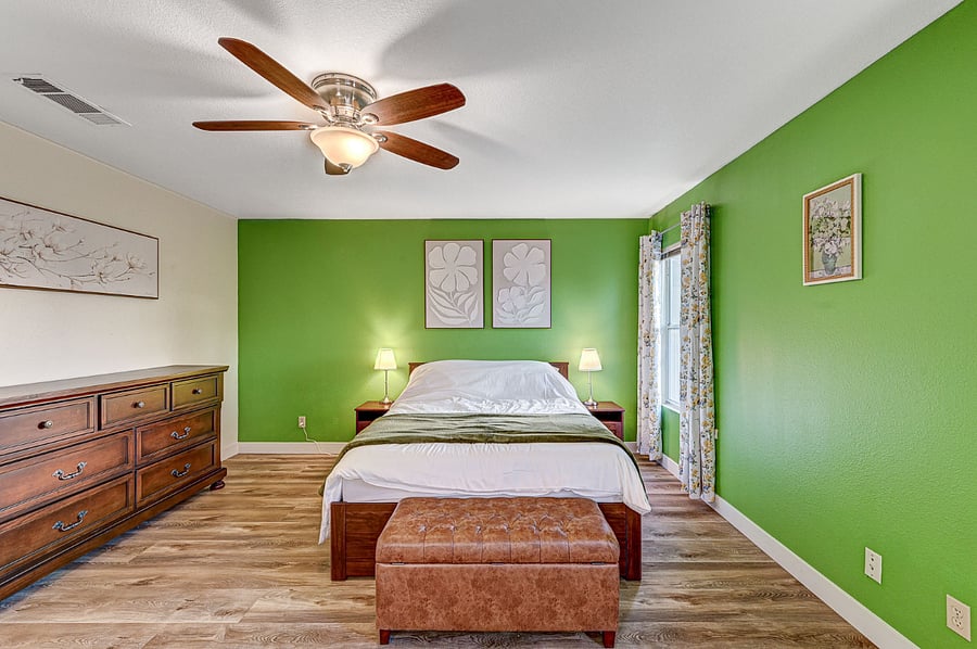 Master bedroom with a queen bed