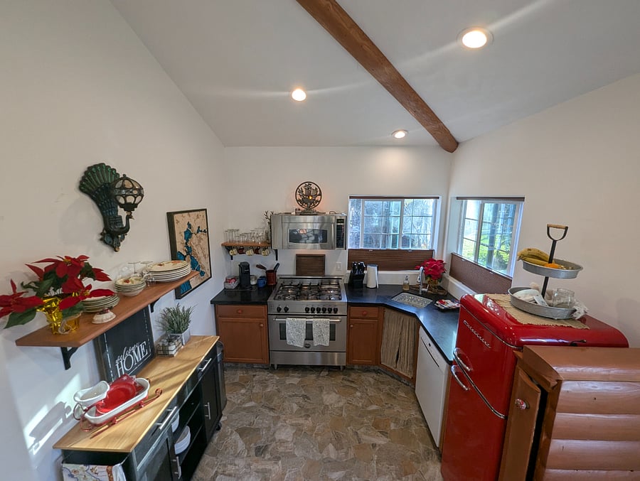 Kitchen is supplied with dishes, glasses cooking utensils, pots, and pans air fryer a Keurig coffee machine, dish towels theres a move-in supply of coffee, tea and spices. Window shades adjust from bottom up or top down