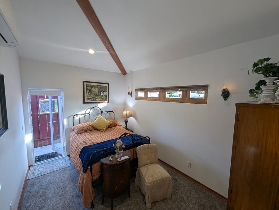 Bright south side bedroom with black out window shades 