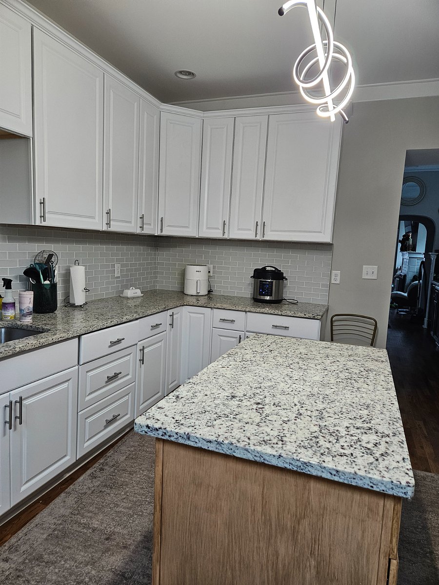kitchen, granite countertops and island. glass tile backsplash