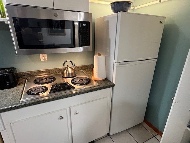 Microwave and large refrigerator