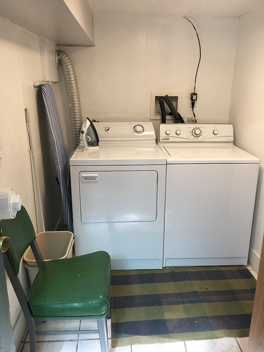 Full washer and dryer - newer and modern equipment- located at the entry of the rental