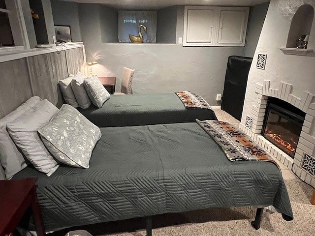 2 single beds arrangement with fireplace
