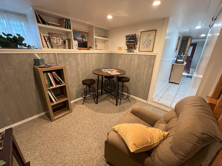 Convenient dining, working, and lounging between the bathroom and kitchen