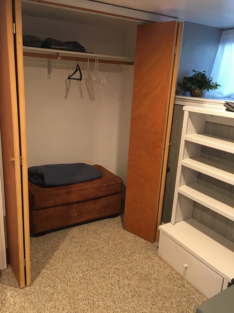 Large closet with book shelf; also there is a 2nd small walk-in storage closet