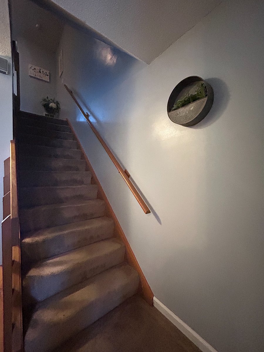 Stairs from main floor to upstairs level