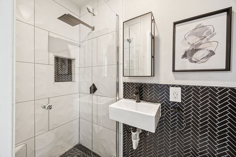 Primary bedroom bathroom with rain shower