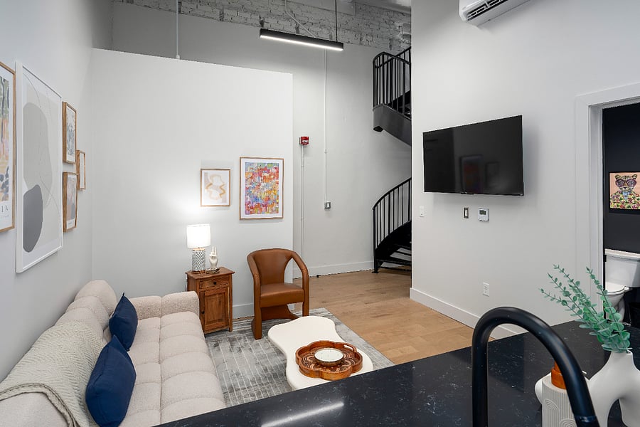Living room, comfy sofa, chair and smart tv. Wifi provided.
