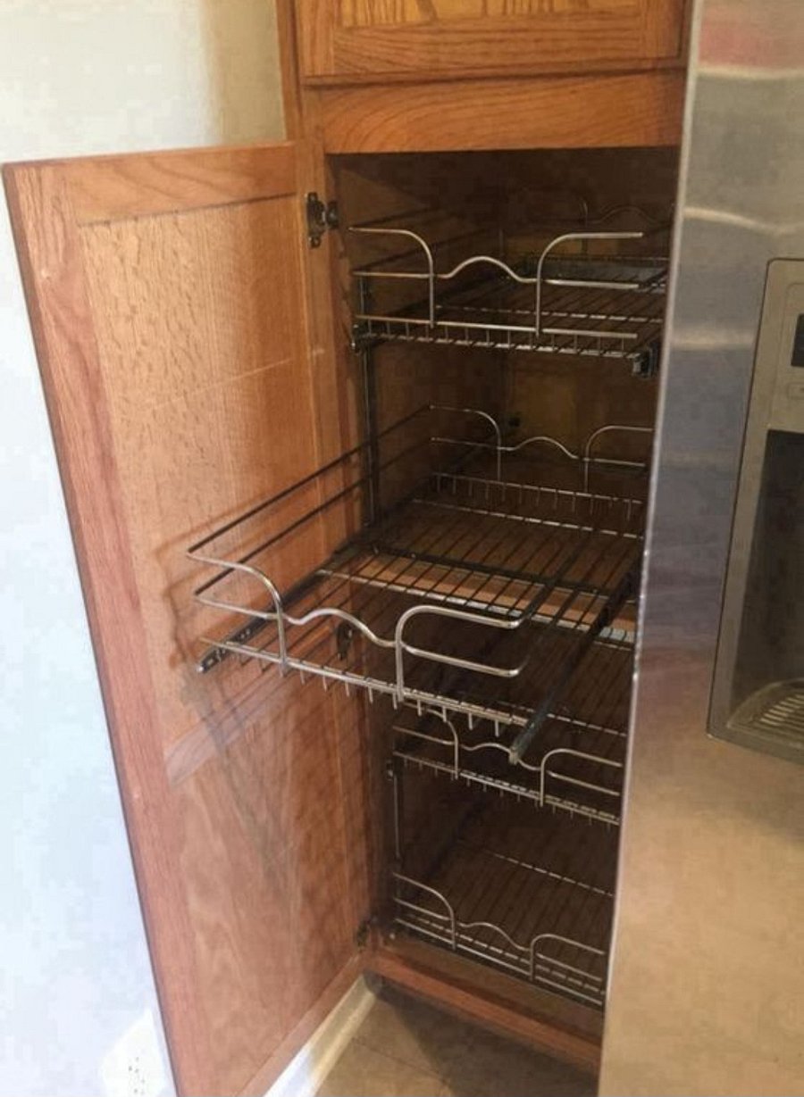 Pantry with roll-out cabinet shelves for efficient storage
