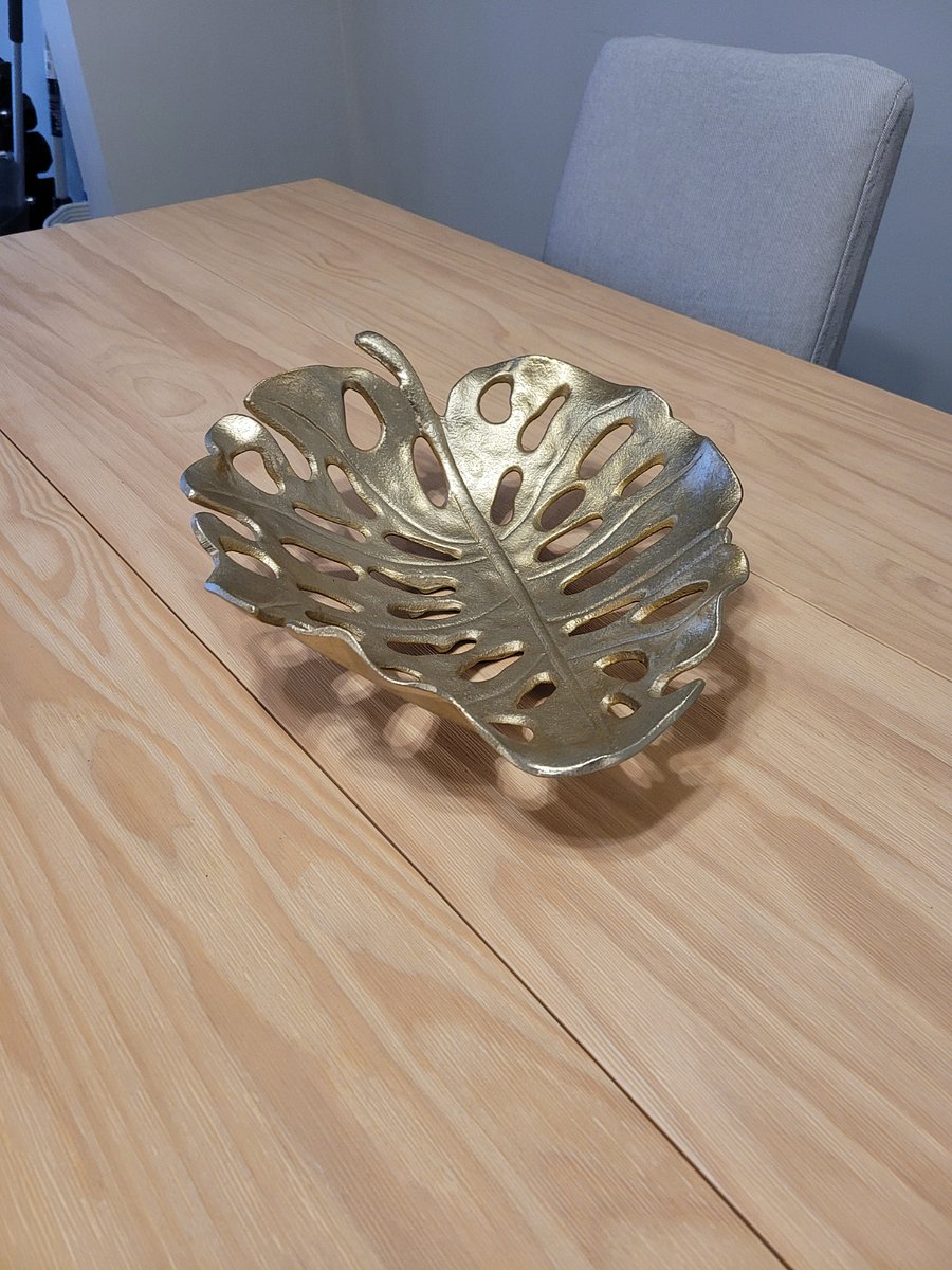 Main floor dining room includes decorative fruit bowl