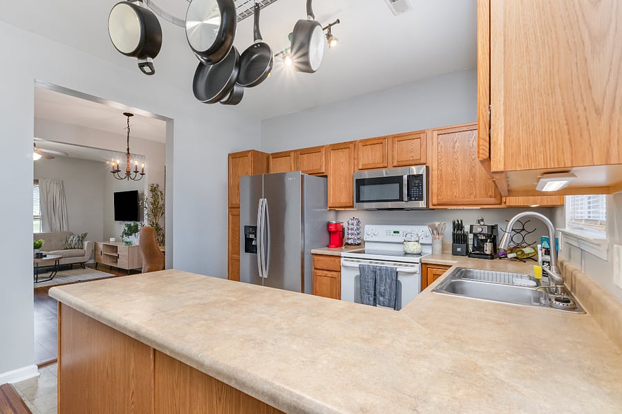 Fully stocked kitchen includes: pots, pans, keurig, De'Longhi espresso maker, kettle, French press, starter coffee pods, kitchen linens, starter cleaning supplies, all utensils and more
