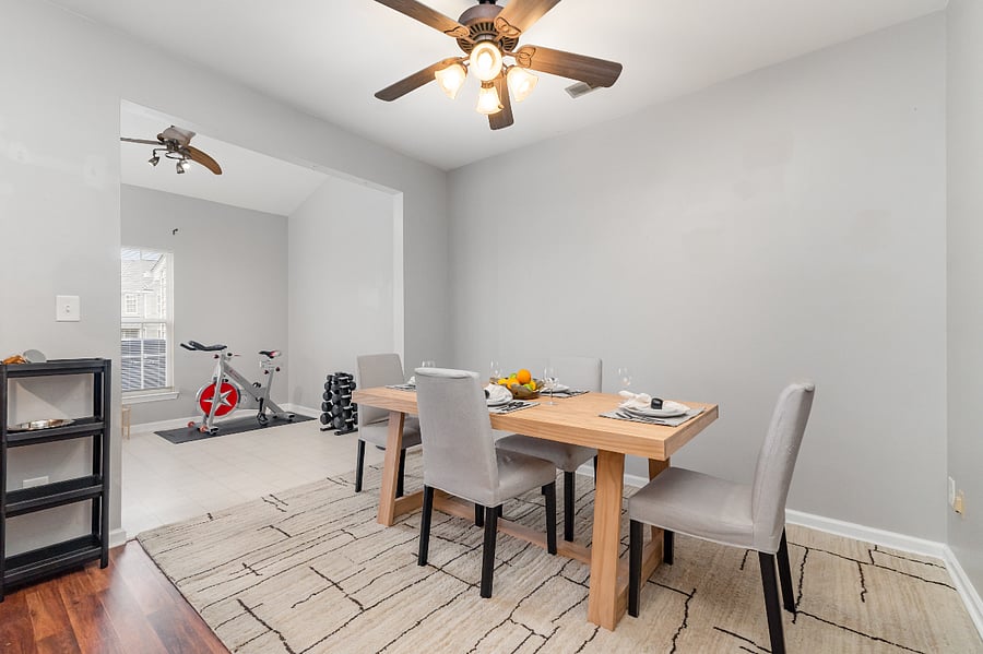 Enjoy access to a dedicated fitness area in the sunroom just off of the dining room