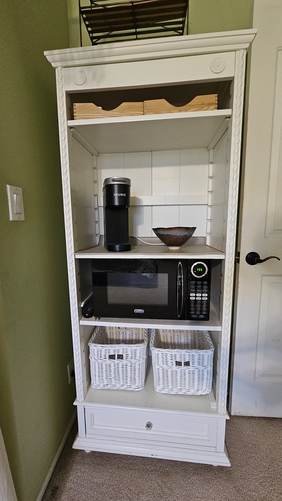 A microwave, mini-fridge, & coffee maker is in your room.