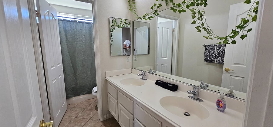 Double Sink Bathroom upstairs in the Hallway. 