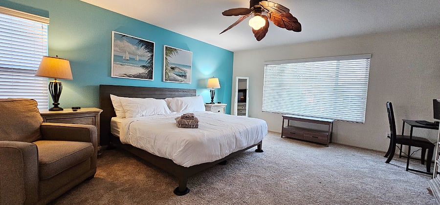 MASTER BEDROOM - Standard King (largest they make), with Cradenza, 55" ROKU SMART TV,  Computer Work Station with Monitor and Large on Super Fast Wifi, mirrorable and Phone Casting Available to MSART TV.  100% Cotton Linens, Hotel Quality with 400 Thread Count. Sealy Mattress and Pillows.