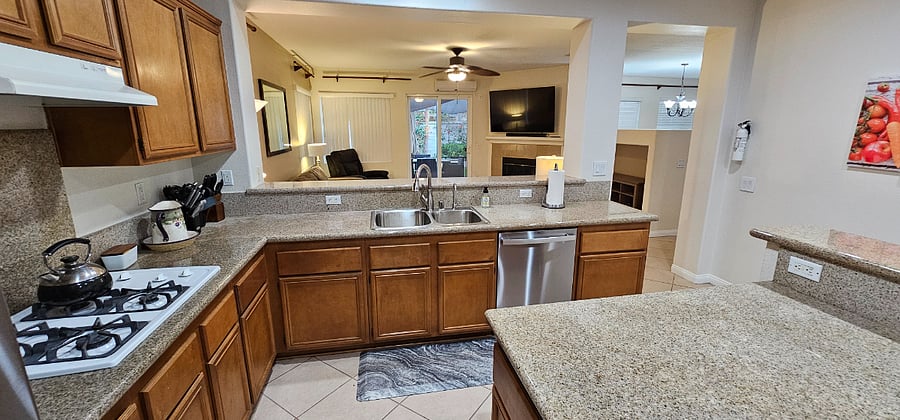 Large Kitchen with view of Large Family room and TV. Keep on the family while cooking and watching a movie or game. Great for an Eveing