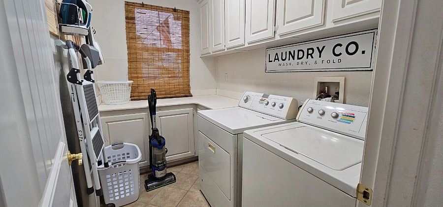 Fully Stocked Laundry with cleaning supplies and cleaning tools. 