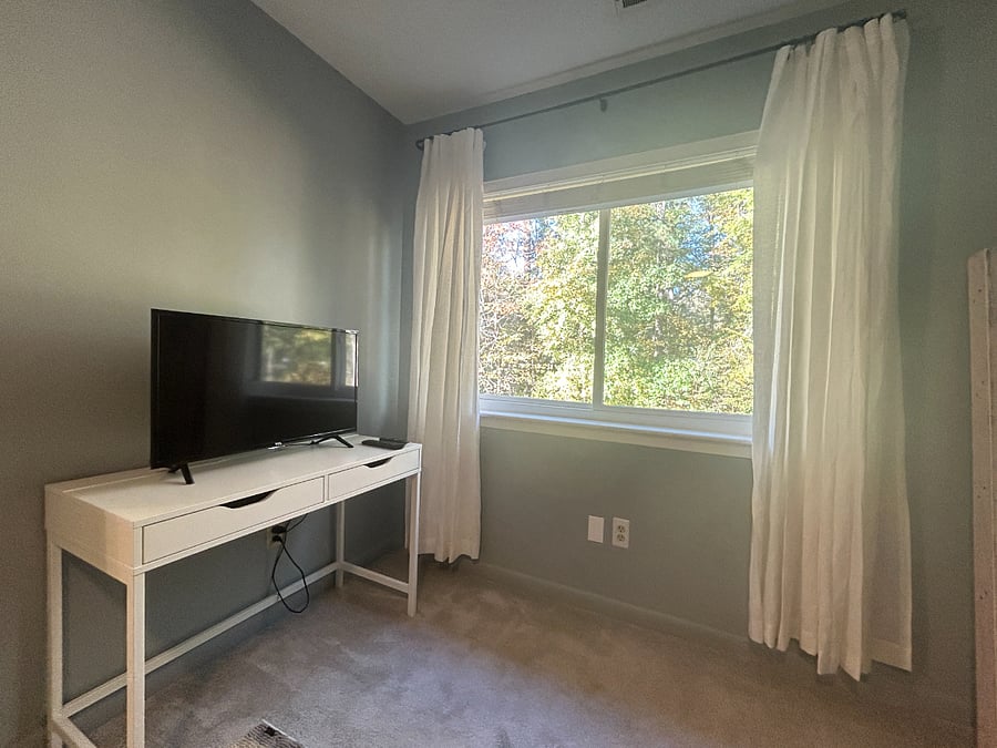 Primary bedroom TV has a Roku for streaming