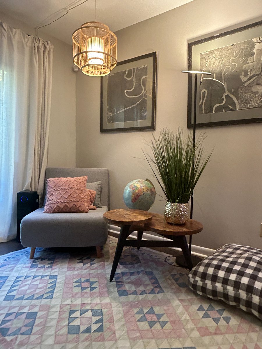 Cozy reading nook that looks out into the backyard.