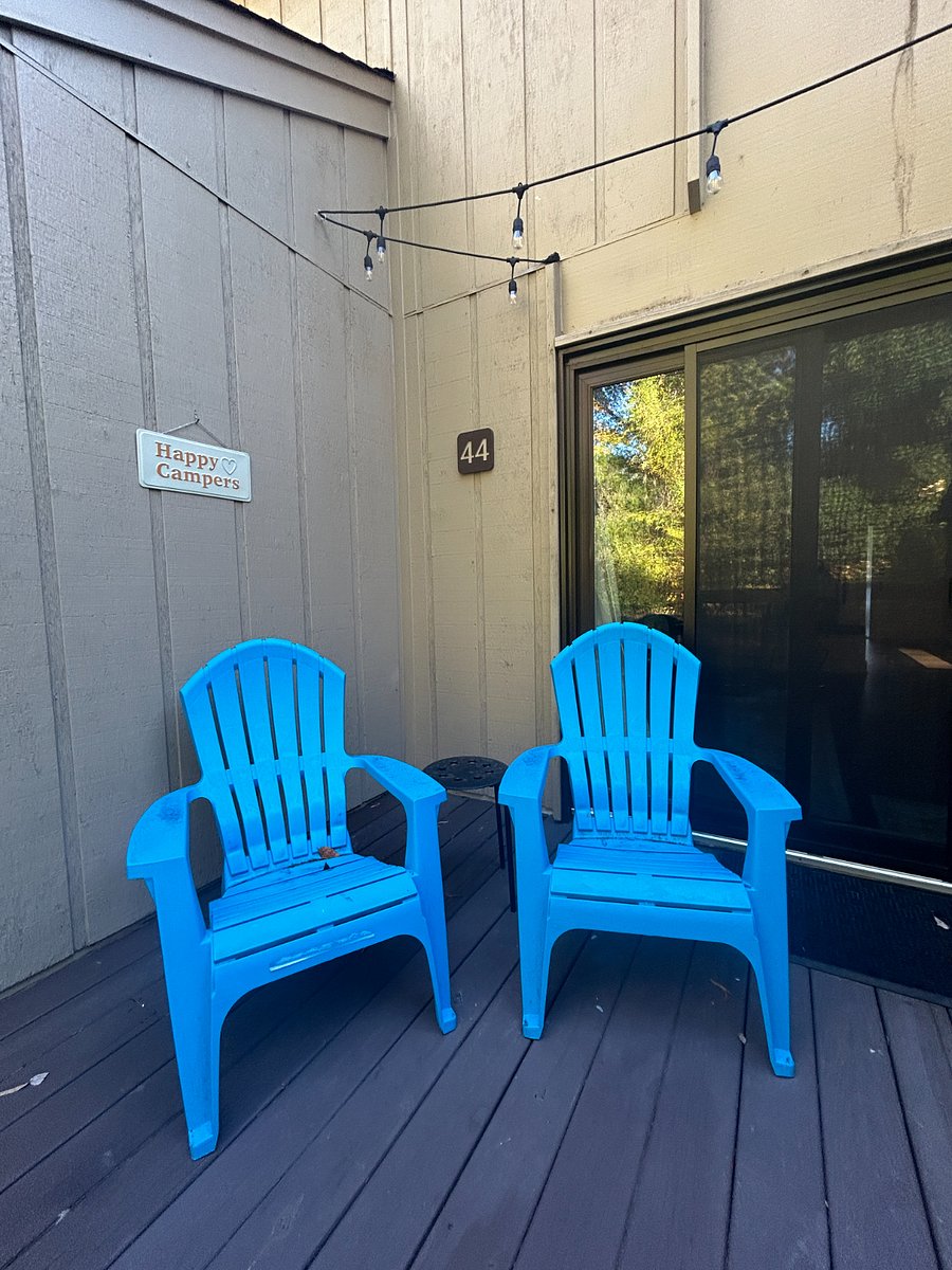 Back porch perfect for drinking coffee or an afternoon beverage