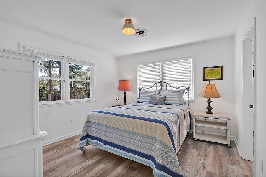 Front bedroom has end tables, chest of drawers, ROKU TV & private bath with walk in shower.