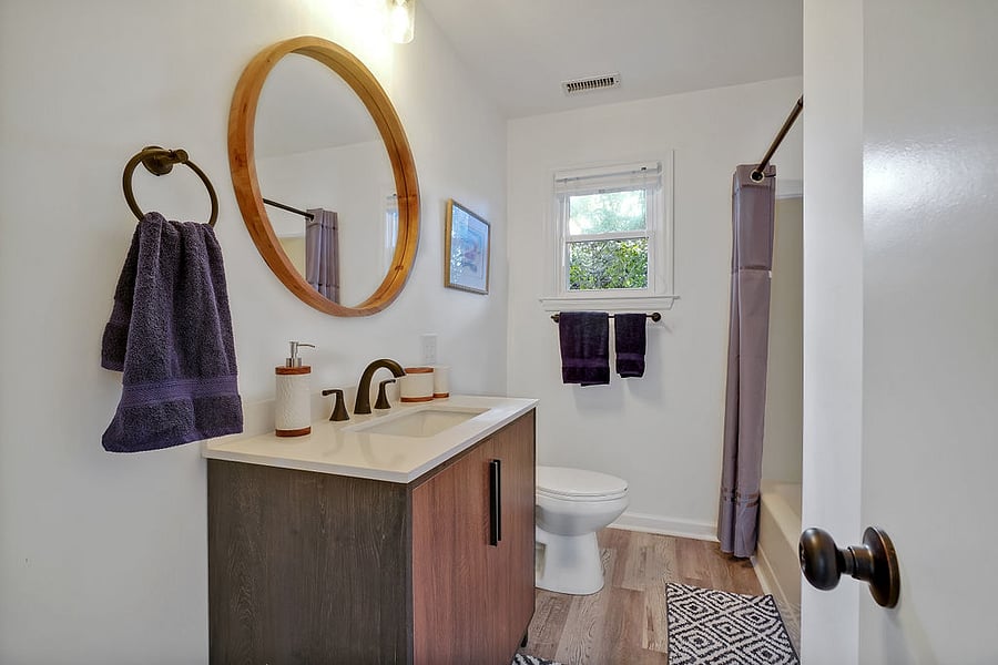 Hall bath has tub/shower combo