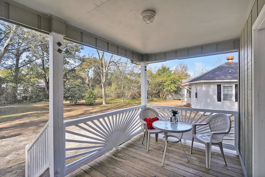 Covered porch over looking the backyard.