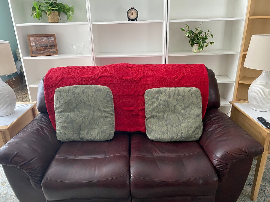 Relax and enjoy the 55" Smart TV and reclining loveseat
