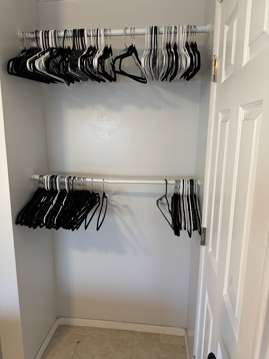 Small closet with full sized bed.