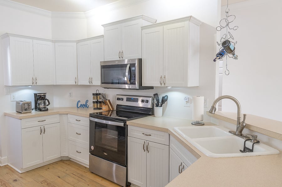 Kitchen: Coffee maker, electric kettle, toaster, rice/pressure cooker, microwave, induction cooktop, oven, dishwasher, refrigerator, pots/pans, tableware (with kids), sheet pans and basic cooking needs