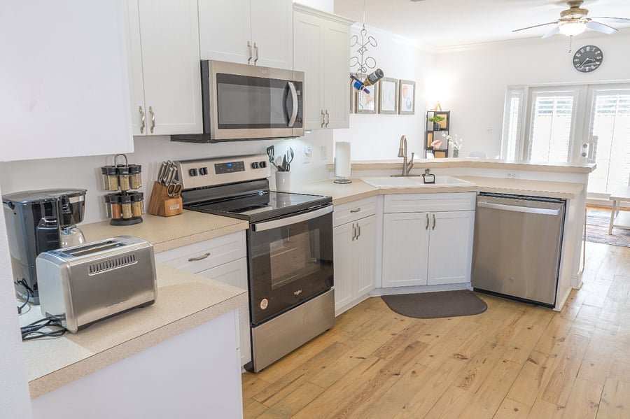 Kitchen: Coffee maker, electric kettle, toaster, rice/pressure cooker, microwave, induction cooktop, oven, dishwasher, refrigerator, pots/pans, tableware (with kids), sheet pans and basic cooking needs