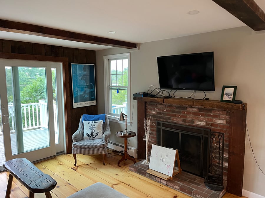 Smart TV above wood buring fireplace
