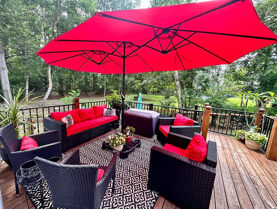 Back deck. A great place for morning coffee and winding down in the afternoon. The umbrella was lost in the snow storm, but I will replace it soon!
