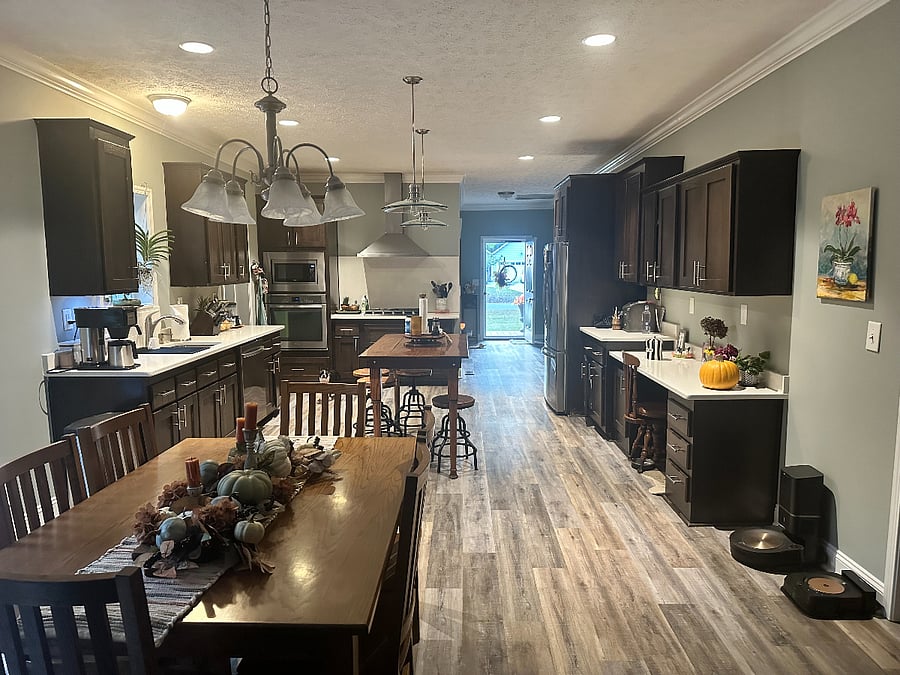 In the Den looking back at the front door. And Kitchen