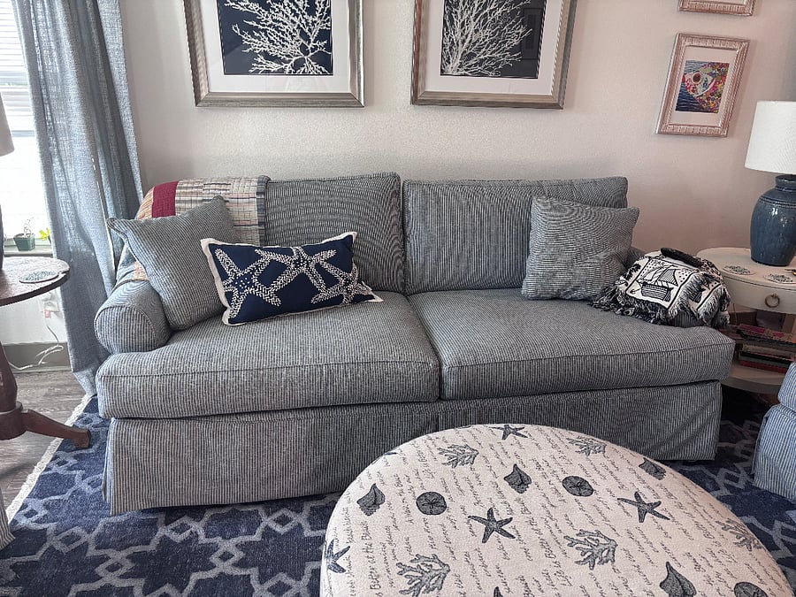 Comfortable couch with blankets always available. Side tables available on both sides, with cute coasters.