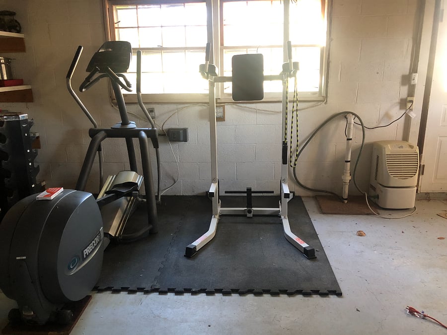 The basement has a small exercise area and plenty of storage space.