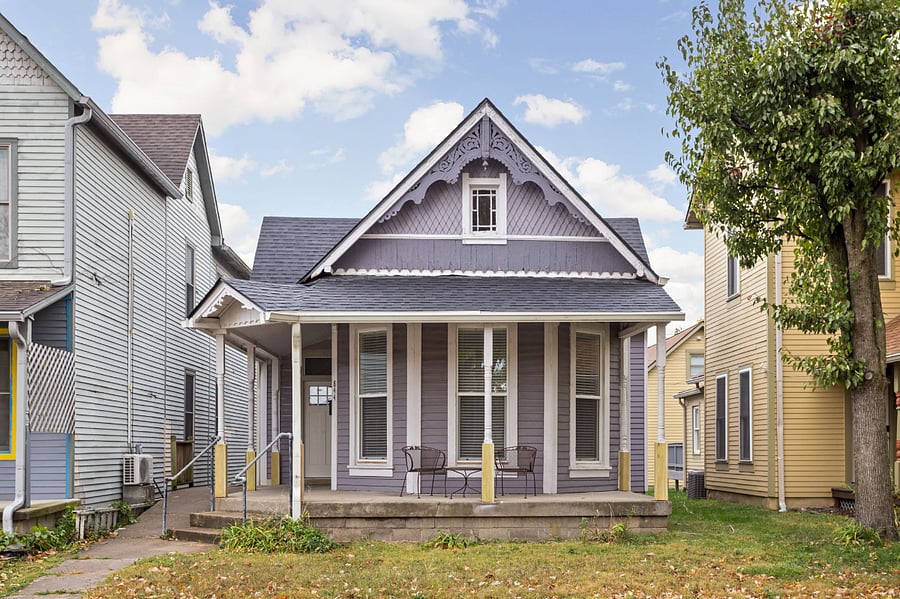 This charming vintage home with a welcoming front porch.