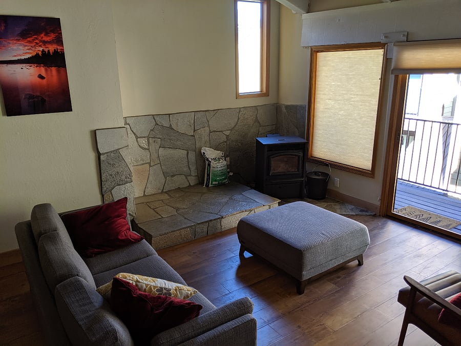 Living room with TV and pellet stove