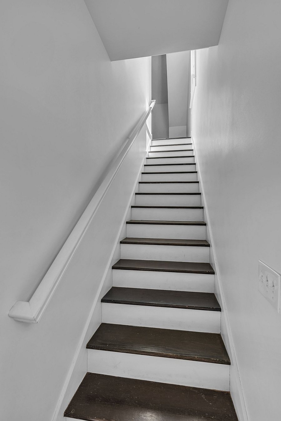 Stairs leading up to apartment from garage