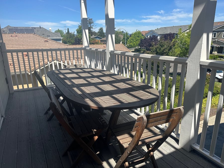 Private deck with table and chairs, perfect for morning coffee or dinner while sun sets
